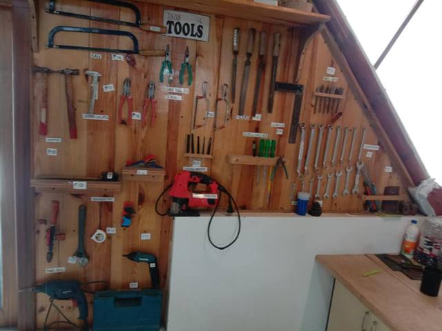 A T-LAB tool wall with each tool on its own hook